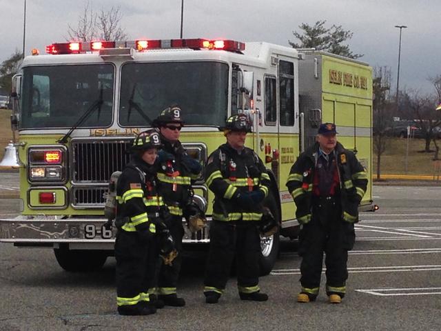 Northstar helo landing zone standby at Woodbridge Center for the patient from a motor vehicle accident on Route 1 North, January 16, 2014. L-R FF Bausch, FF Redeker, Ex-Chief Mullen, Ex-Chief Christensen.